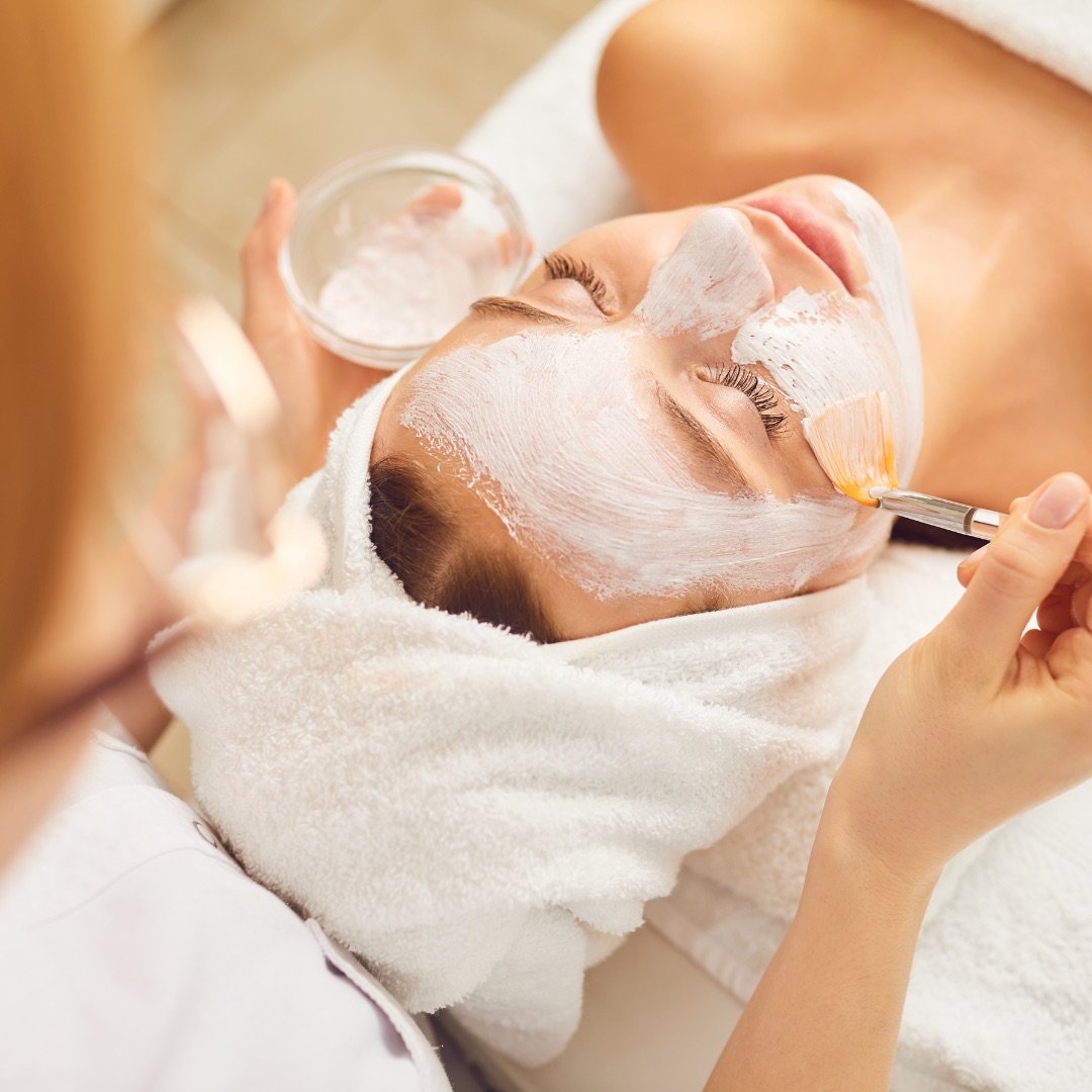 Face mask being applied during a facial treatment