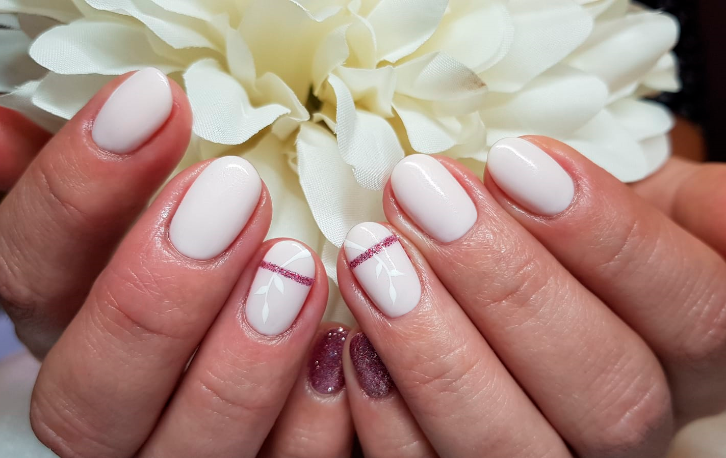Bridal nail art with floral detail